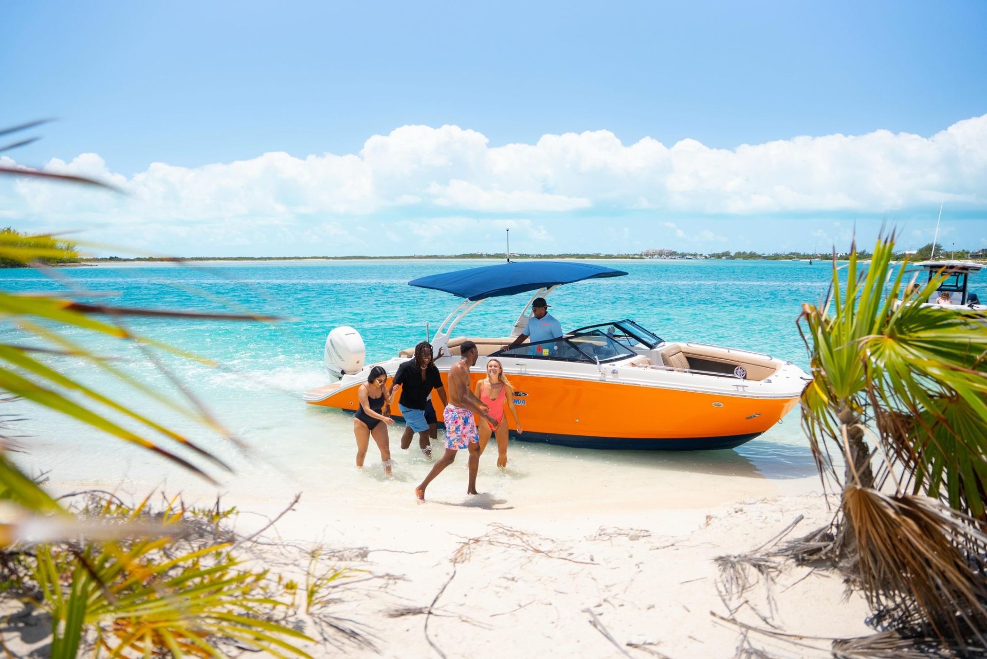 Guests arriving on a private beach